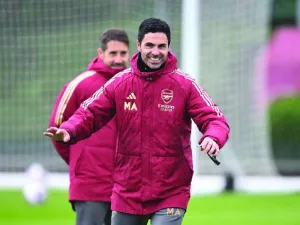 Arsenal manager Mikel Arteta is all smiles at a training session on Friday.