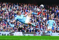 Manchester City’s Erling Haaland shoots during the Premier League match against Wolverhampton Wanderers at the Etihad Stadium in Manchester on Saturday. (Reuters)