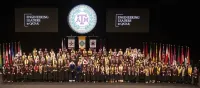 The Class of 2024 of Tamuq with officials.