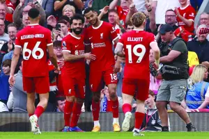 
Liverpool’s Cody Gakpo (centre) celebrates with teammate Mohamed Salah (second from left) after scoring a goal during the Premier League match against Tottenham Hotspur at Anfield in Liverpool yesterday. (AFP) 