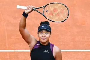 Japan&#039;s Naomi Osaka celebrates after winning against France&#039;s Clara Burel at the Women&#039;s WTA Rome Open tennis tournament at Foro Italico in Rome on Wednesday. (AFP)