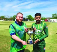 Pakistan captain Babar Azam (right) and Ireland skipper Paul Stirling pose with the T20I series trophy in Dublin on Thursday. The 
three-match series gets underway with the first match to be played in Dublin on Friday. (@TheRealPCB)