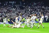 
Real Madrid’s players celebrate their victory in the Champions League second leg semi-final against Bayern Munich in Madrid on Wednesday night. (AFP) 
