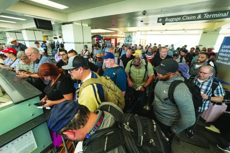 Travellers at Milwaukee Mitchell International Airport, in Milwaukee, Wisconsin, US on July 19, 2024. A glitch to software developed by a cloud-based cybersecurity platform last month crashed millions of computers, grinding many critical systems worldwide to a halt. The IT outage disrupted flight scheduling systems, leading to delays and cancellations. Travellers at Milwaukee Mitchell International Airport, in Milwaukee, Wisconsin, US on July 19, 2024. A glitch to software developed by a cloud-based cybersecurity platform last month crashed millions of computers, grinding many critical systems worldwide to a halt. The IT outage disrupted flight scheduling systems, leading to delays and cancellations.