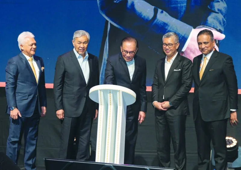 Malaysian Prime Minister Anwar Ibrahim (centre) leading the opening ceremony of MIHAS 2024. Looking on are (from left) Mohd Mustafa Abdul Aziz, MATRADE CEO; Dr Ahmad Zahid bin Hamidi, Malaysian Deputy Prime Minister; Tengku Zafrul Aziz, Malaysia’s Minister of Investment, Trade and Industry; and Reezal Merican Naina Merican, MATRADE chairman. Malaysian Prime Minister Anwar Ibrahim (centre) leading the opening ceremony of MIHAS 2024. Looking on are (from left) Mohd Mustafa Abdul Aziz, MATRADE CEO; Dr Ahmad Zahid bin Hamidi, Malaysian Deputy Prime Minister; Tengku Zafrul Aziz, Malaysia’s Minister of Investment, Trade and Industry; and Reezal Merican Naina Merican, MATRADE chairman.