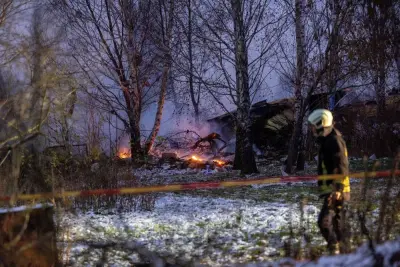 Rescuer walks past DHL cargo plane wreckage, at the crash site near Vilnius International Airport, Lithuania, on Monday. Lukas Balandis/BNS via REUTERS Rescuer walks past DHL cargo plane wreckage, at the crash site near Vilnius International Airport, Lithuania, on Monday. Lukas Balandis/BNS via REUTERS