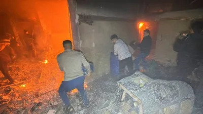 Palestinians try to extinguish a fire inside a house near Kamal Adwan hospital, in Beit Lahiya, in the northern Gaza Strip, on Tuesday. REUTERS Palestinians try to extinguish a fire inside a house near Kamal Adwan hospital, in Beit Lahiya, in the northern Gaza Strip, on Tuesday. REUTERS