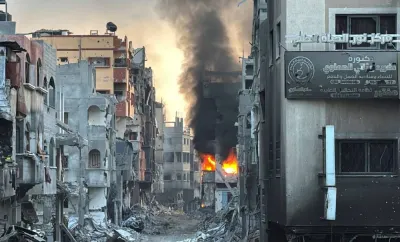 A fire burns inside a Palestinian house during the ongoing Israeli military operation, in Beit Lahiya, in the northern Gaza Strip, on Wednesday.  A fire burns inside a Palestinian house during the ongoing Israeli military operation, in Beit Lahiya, in the northern Gaza Strip, on Wednesday.