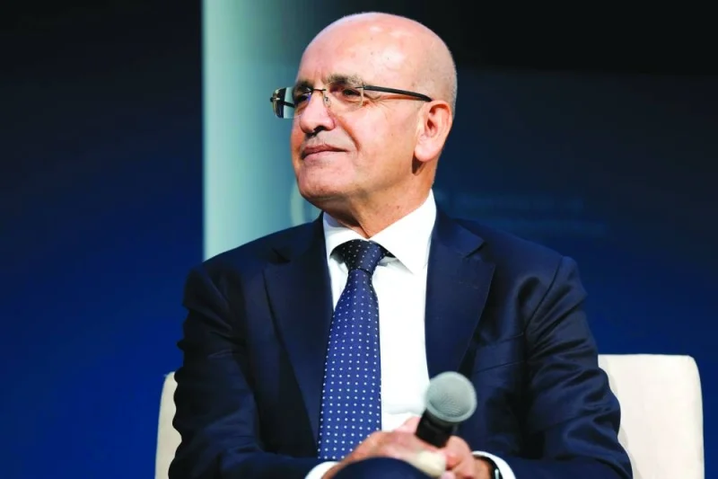 Mehmet Simsek, Turkiye's Treasury and Finance Minister . Mehmet Simsek, Turkiye's Treasury and Finance Minister .