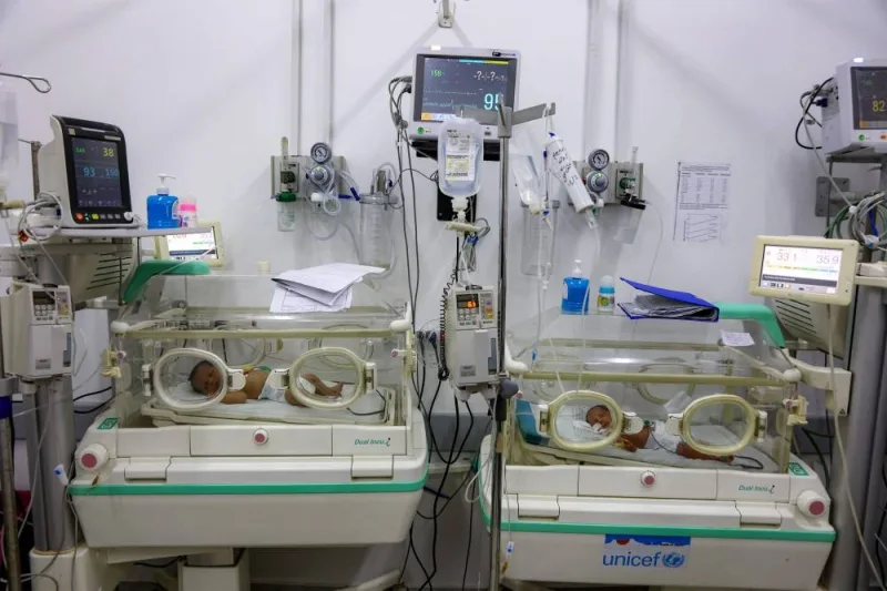 Prematurely-born infants lie in incubators at the neonatal intensive care unit (NICU) at the Patient Friend's Benevolent Society hospital in Gaza City on Tuesday. AFP Prematurely-born infants lie in incubators at the neonatal intensive care unit (NICU) at the Patient Friend's Benevolent Society hospital in Gaza City on Tuesday. AFP