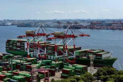 Shipping containers and a container ship at the international cargo terminal in Tokyo. The Japanese economy grew by 0.3% in the second quarter, official preliminary data showed Friday. Shipping containers and a container ship at the international cargo terminal in Tokyo. The Japanese economy grew by 0.3% in the second quarter, official preliminary data showed Friday.