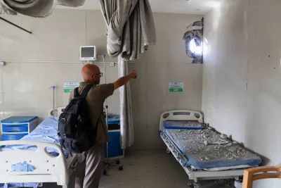 A man gestures as he inspects the damage at The Helou International Specialty Hospital, following an Israeli raid, amid an Israeli military operation, in Gaza City, Monday. REUTERS A man gestures as he inspects the damage at The Helou International Specialty Hospital, following an Israeli raid, amid an Israeli military operation, in Gaza City, Monday. REUTERS
