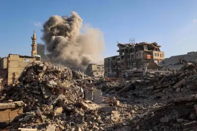 Smoke billows following an Israeli strike that targeted a building in the Bureij camp for Palestinian refugees in the central Gaza Strip on Sunday. AFP Smoke billows following an Israeli strike that targeted a building in the Bureij camp for Palestinian refugees in the central Gaza Strip on Sunday. AFP
