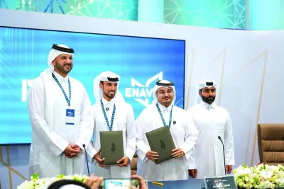 Ghanim al-Sulaiti, founder of Enbat Group and Papercut, and Saoud al-Emadi, CEO & founder of Enavra, signed the agreement in the presence of QDB CEO Abdulrahman bin Hesham al-Sowaidi and QDB executive director of SME Development Dr Hamad Salem Mejegheer. Ghanim al-Sulaiti, founder of Enbat Group and Papercut, and Saoud al-Emadi, CEO & founder of Enavra, signed the agreement in the presence of QDB CEO Abdulrahman bin Hesham al-Sowaidi and QDB executive director of SME Development Dr Hamad Salem Mejegheer.