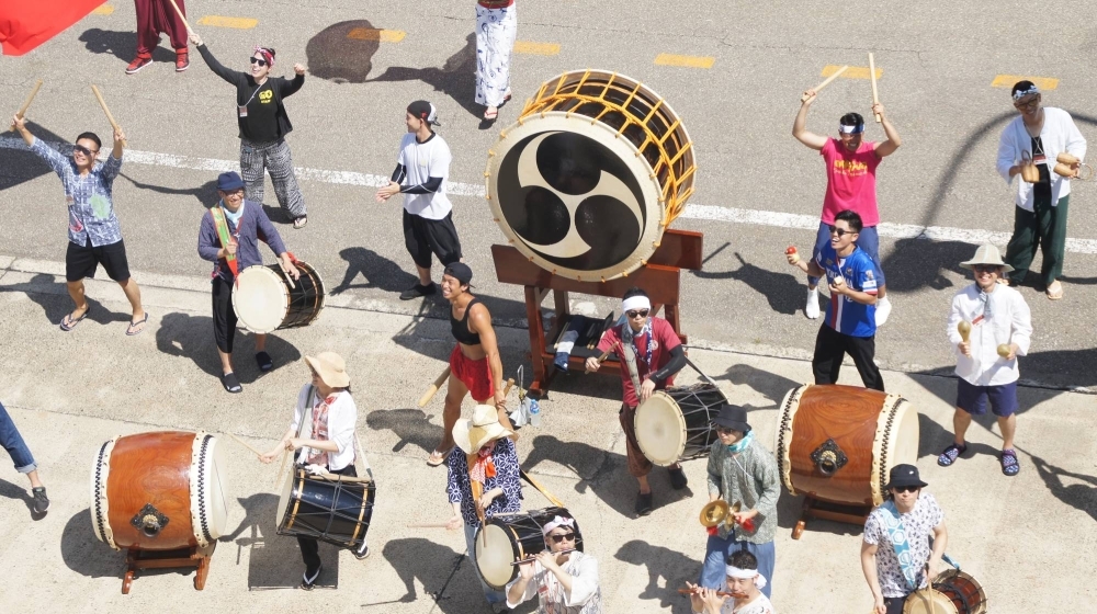 At Sado Island's Earth Celebration, taiko players even bid farewell to audience members departing on a mainland-bound ferry.