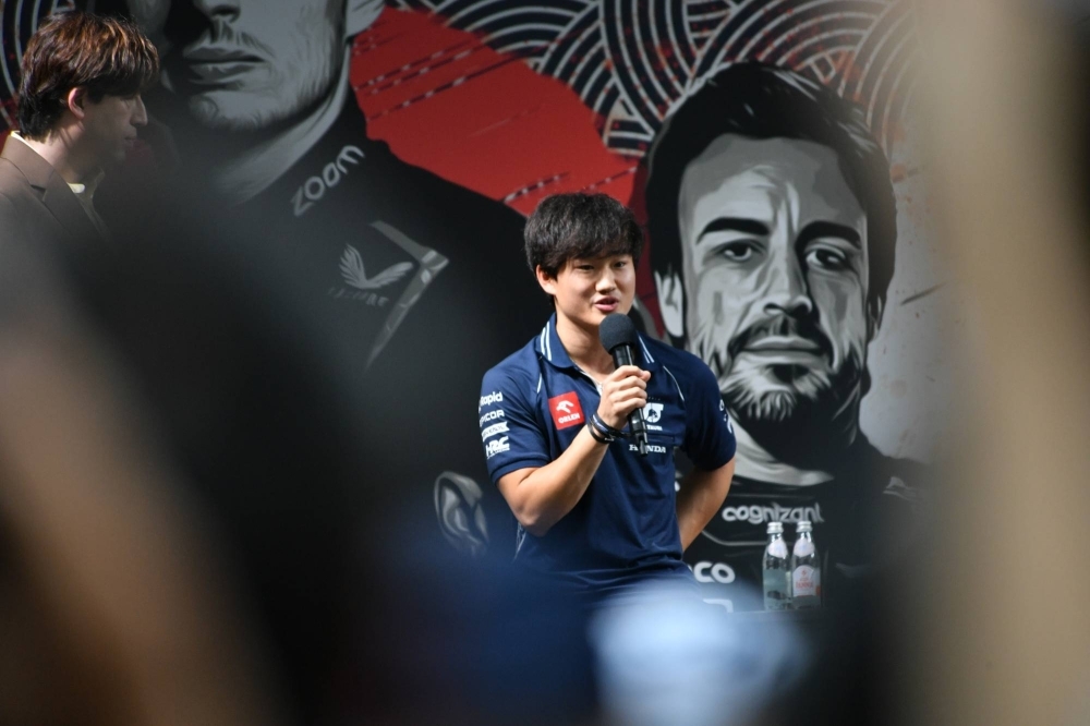 Yuki Tsunoda speaks to the crowd during the F1 Tokyo Festival event in Shinjuku on Wednesday.