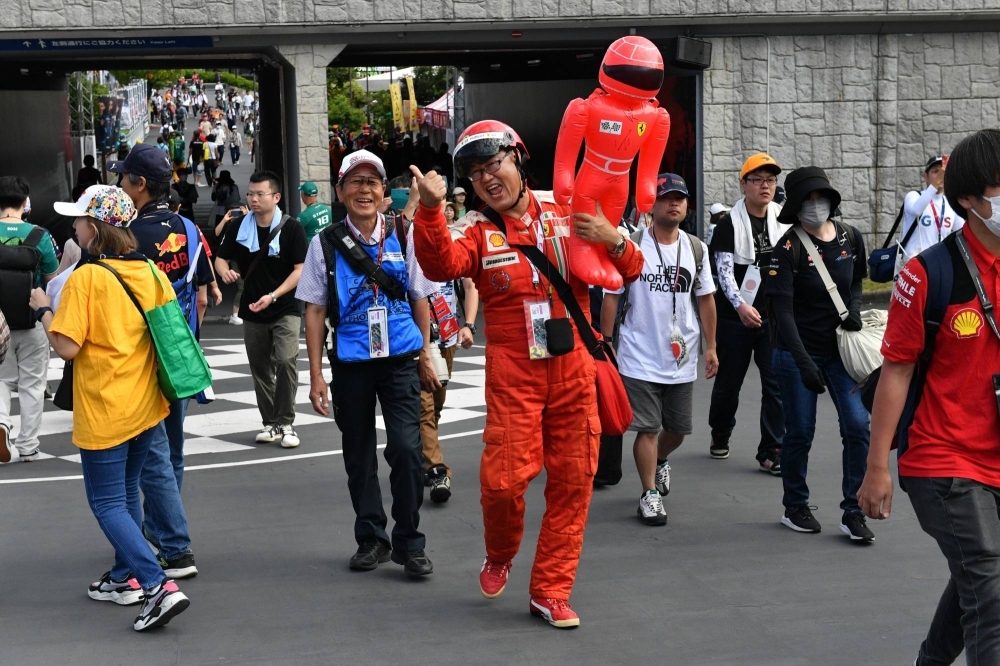 Fans steam into the main gates at Suzuka Circuit ahead of the Japanese Grand Prix on Sunday.
