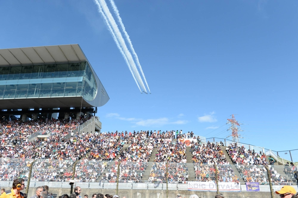 Blue Impulse, the Air Self-Defense Force's acrobatics team, performs a flyover before Sunday's race.