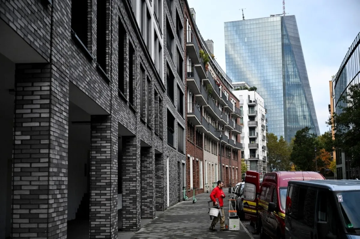 FRANKFURT: The headquarters of the European Central Bank (ECB, background) are pictured next to a housing area in Frankfurt am Main, western Germany, on Ocober 26, 2023 ahead the meeting of the governing council of the ECB. -- AFP