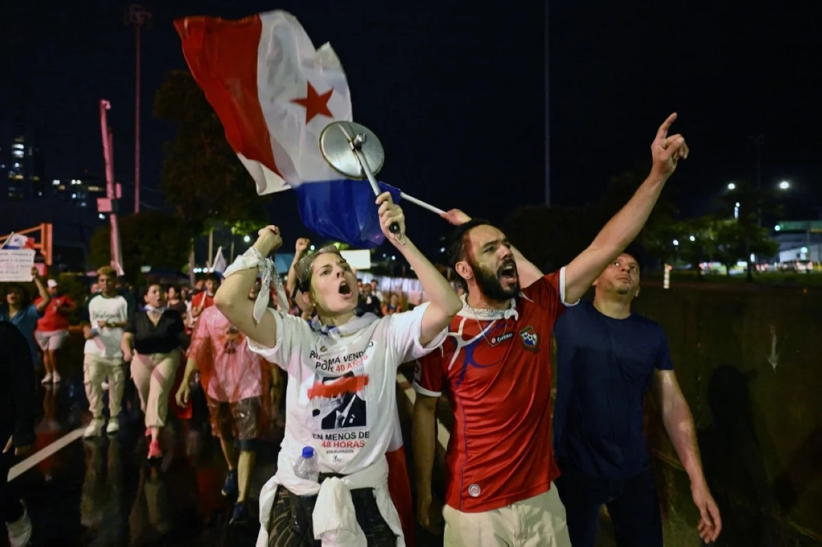 PANAMA CITY: People protest during a march against the government contract with Canadian mining company First Quantum and its subsidiary Minera Panama in Panama City on October 27, 2023.--AFP