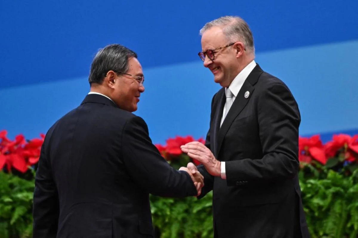 SHANGHAI: China's Premier Li Qiang (left) and Australia's Prime Minister Anthony Albanese shake hands during the opening ceremony of the 6th China International Import Expo (CIIE) in Shanghai on November 5, 2023. – AFP