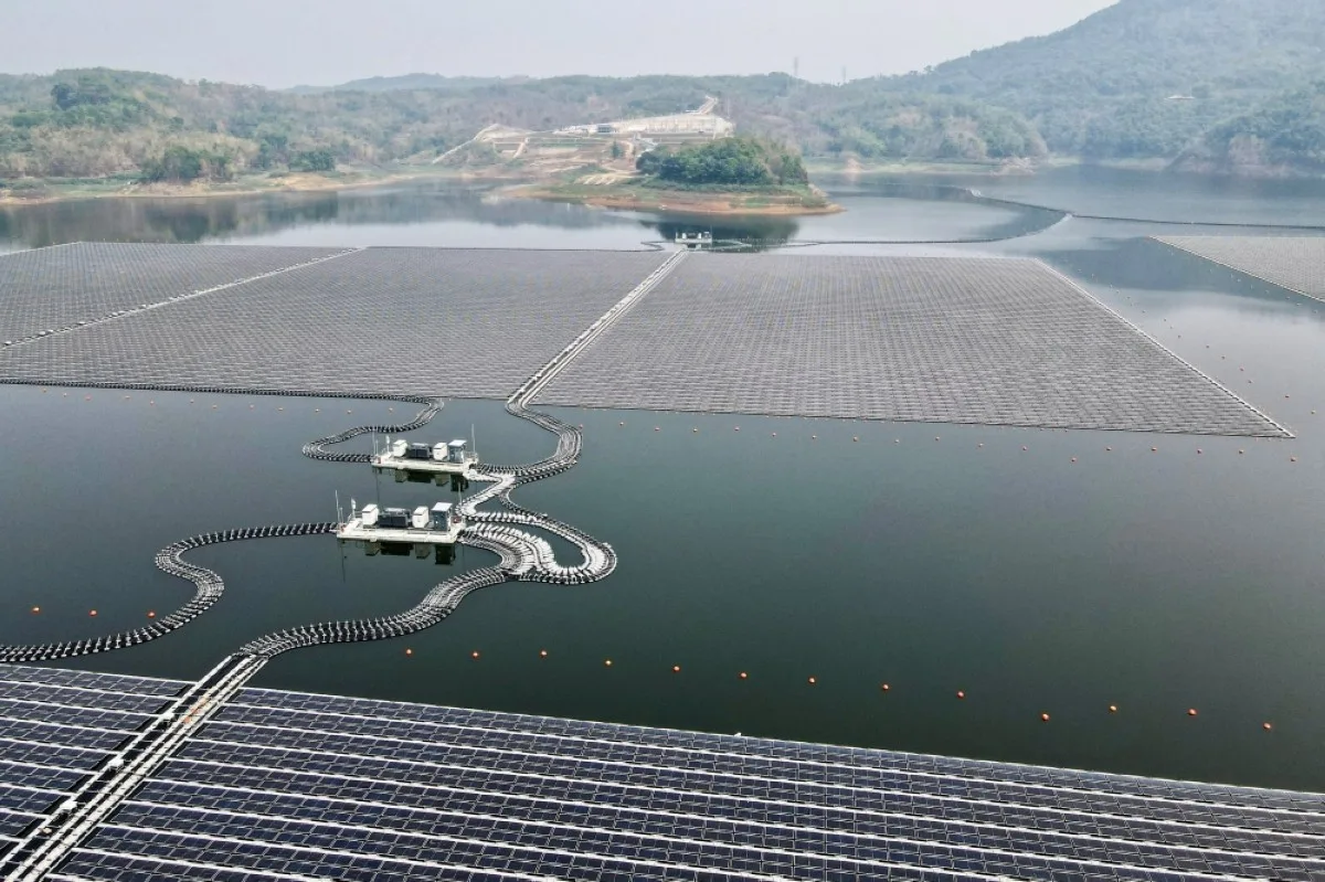 CIRATA: This aerial picture shows the newly built floating solar power plant on the water that can generate 192 mega watts of peak electricity in cooperation between the Indonesian government and Masdar from the UAE, at Cirata Reservoir, West Java, on November 9, 2023, shortly before being inaugurated by President Joko Widodo. –AFP