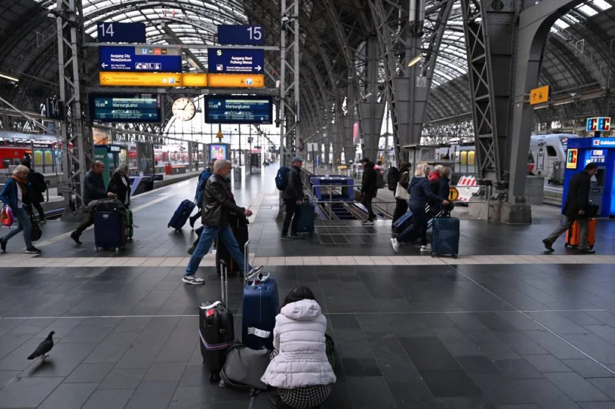 FRANKFURT: Commuters walk at the main station of Frankfurt am Main, western Germany on November 16, 2023, as German train drivers’ union GDL called for a 20-hour strike after failing to reach agreement on pay increases. – AFP