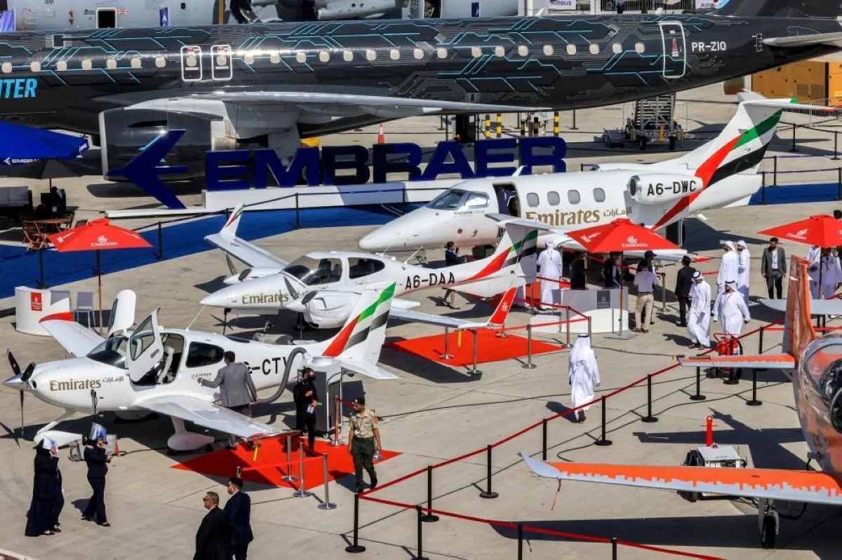 JEBEL ALI: Emirates Flight Training Academy Cirrus Aircraft SR22 and Diamond DA42 propeller planes along with an Embraer Phenom 100 are displayed on the tarmac during the 2023 Dubai Airshow at Dubai World Central - Al-Maktoum International Airport in Dubai. – AFP