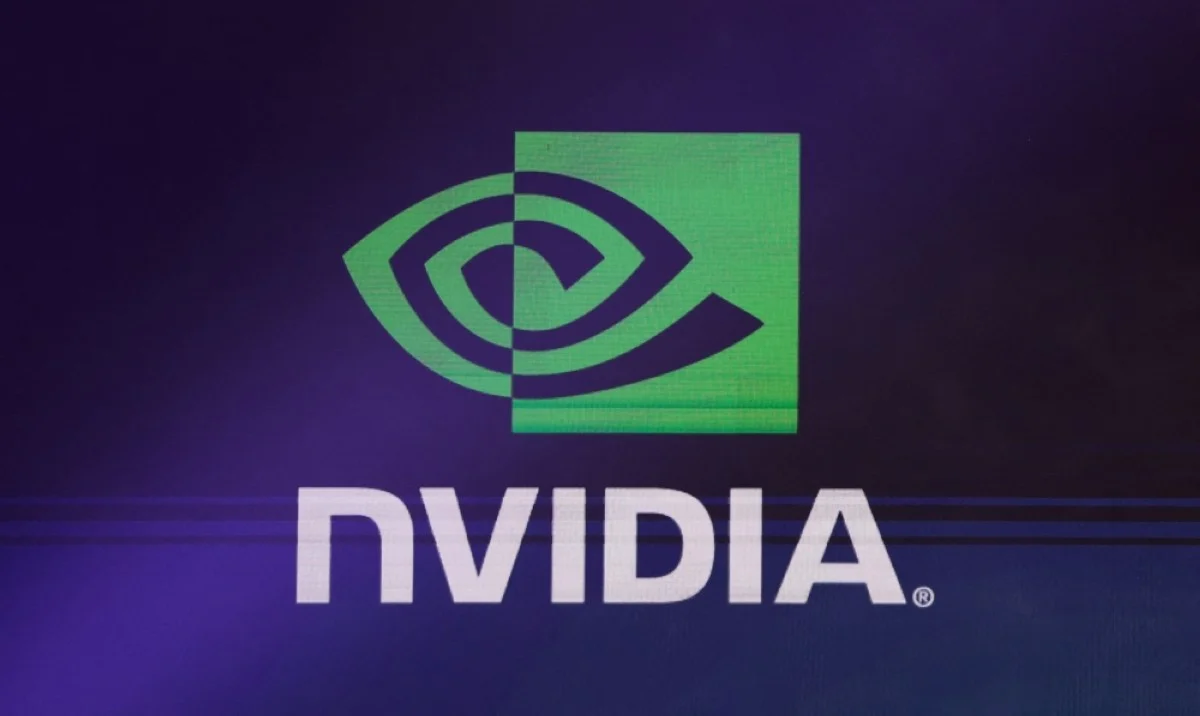 (FILES) The logo of Nvidia is seen during the Hon Hai Tech Day in Taipei on October 18, 2023. - Nvidia on November 21, 2023 reported that its revenue more than tripled in the recently ended quarter as companies snapped up chips to power artificial intelligence (AI). The Silicon Valley chip titan said it made a profit of $9.2 billion on revenue that soared to $18.1 billion, compared with $5.9 billion in the same quarter a year earlier. (Photo by I-Hwa Cheng / AFP)