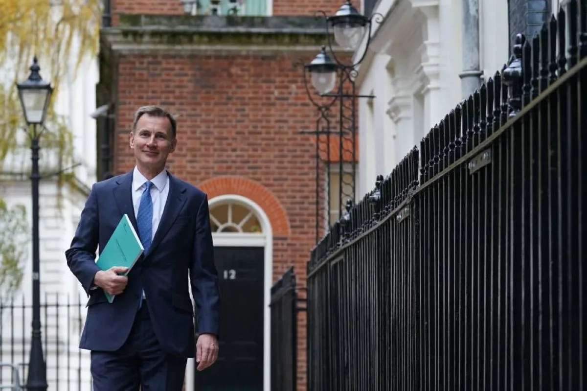 Britain's Chancellor of the Exchequer Jeremy Hunt leaves 11 Downing Street to present his Autumn Budget Statement at the House of Commons in London on November 22, 2023. (Photo by Stefan Rousseau / POOL / AFP)