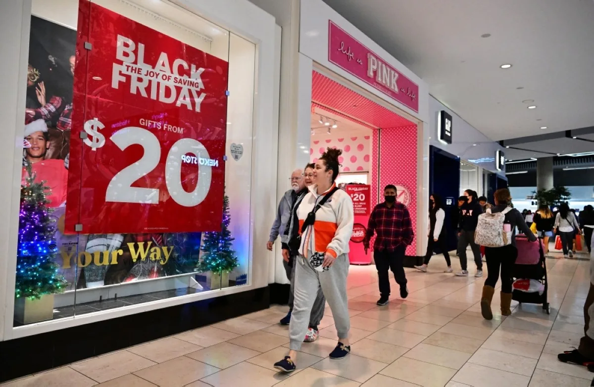 ARCADIA, United States: People shop during Black Friday in Santa Anita within the city of Arcadia, California on November 25, 2022. – AFP