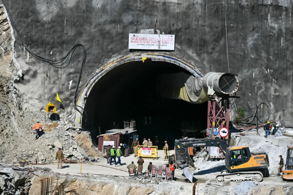 UTTARKASHI, India: Rescue personnel work at the mouth of the collapsed under construction Silkyara tunnel in the Uttarkashi district of India's Uttarakhand state, on November 24, 2023. -- AFP