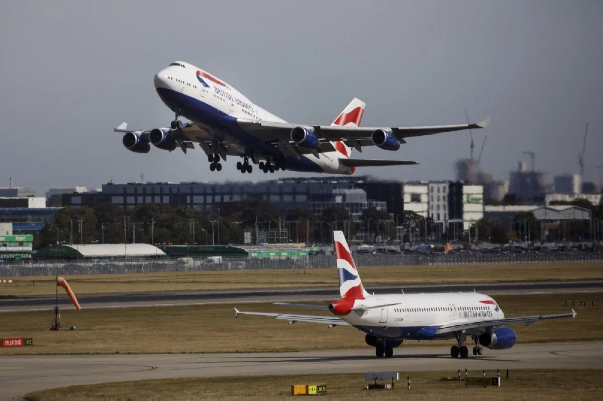 HEATHROW: A British Airways aeroplane takes off from the runway at Heathrow Airport's Terminal 5 in west London. – AFP