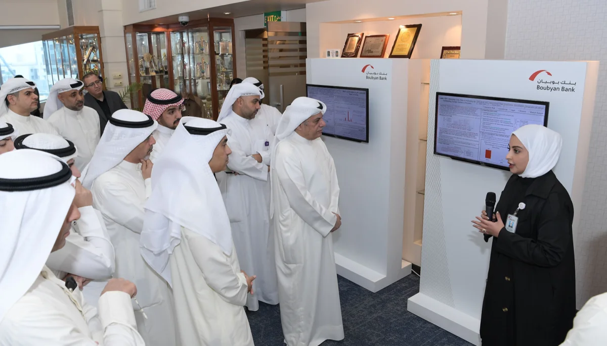 Adel Al-Majed and Boubyan leaders at the gallery.