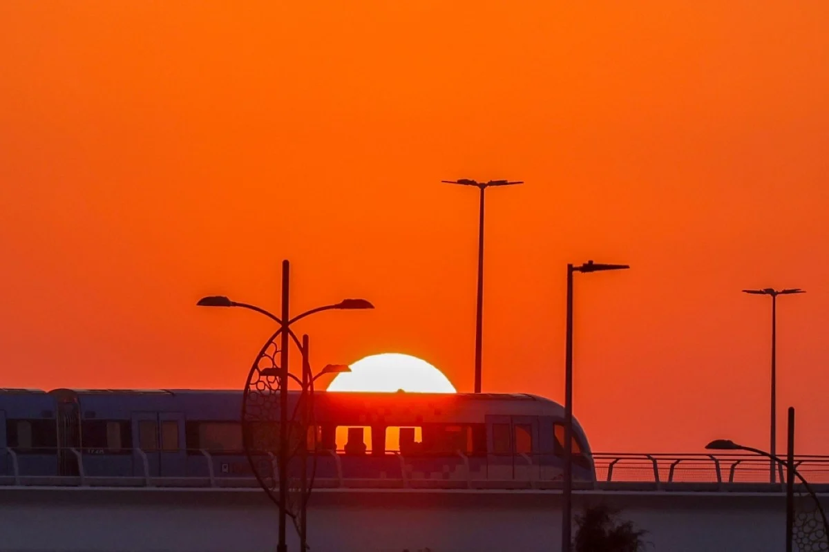 DUBAI: A metro train approaches Expo City station, the venue of the COP28 United Nations climate summit, in Dubai on December 6, 2023. – AFP