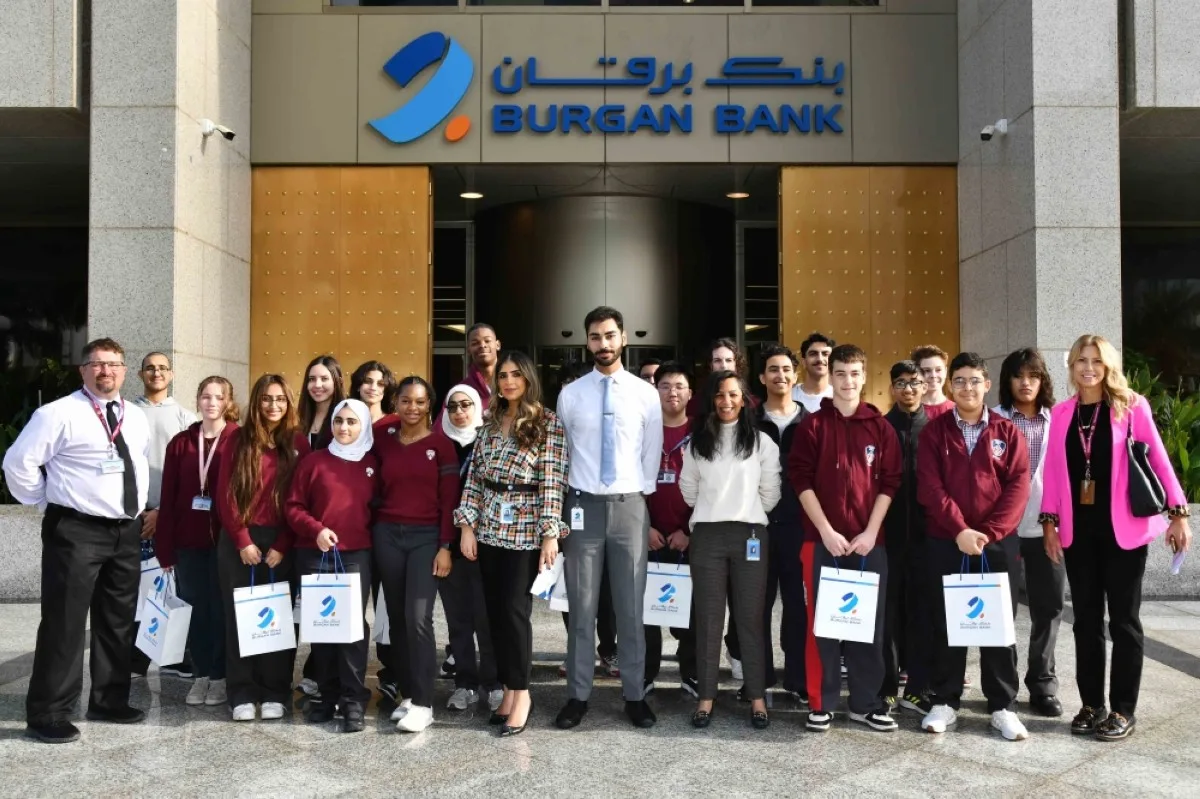 The Burgan Bank team with students