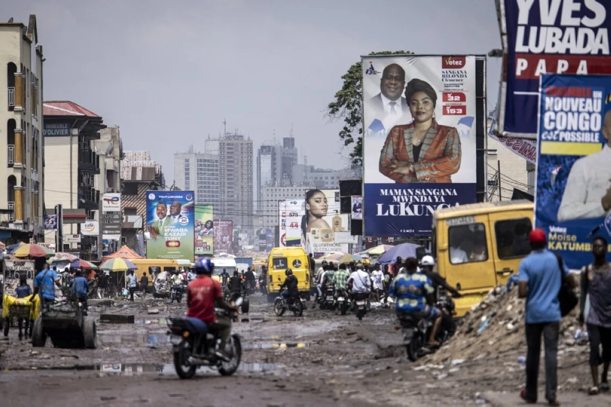 Election campaign banners are pictured along a road in Kinshasa on December 14, 2023. -- AFP