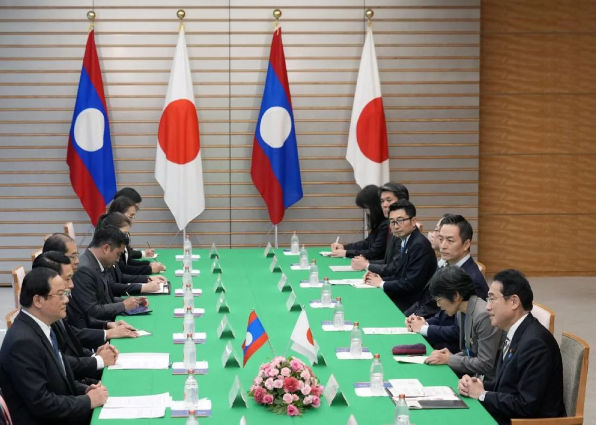 TOKYO: Japan's Prime Minister Fumio Kishida (right) delivers an opening address at the start of a bilateral meeting with Laos' Prime Minister Sonexay Siphandone (L) at the prime minister's official residence in Tokyo on December 16, 2023. -- AFP
