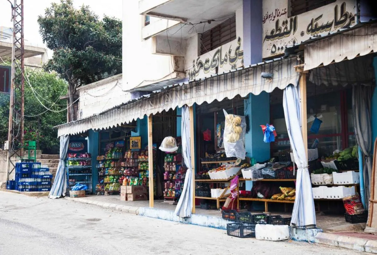 KAFR KILA, Lebanon: This picture shows a grocery store that remained open in the village of Kfar Kila near the border. – AFP
