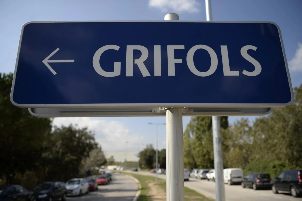 SANT CUGAT DEL VALLES: This picture shows a sign pointing the direction towards the headquarters of Spanish pharmaceutical firm Grifols in Sant Cugat del Valles, near Barcelona. – AFP