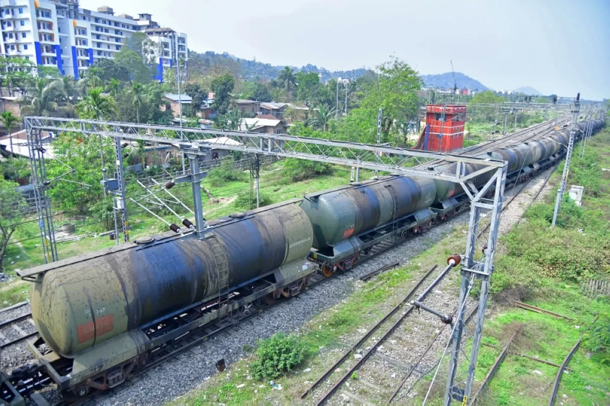 GUWAHATI: An oil tankers train passes near the Guwahati Refinery operated by Indian Oil Corporation, in Guwahati. Indian purchases of Russian crude in defiance of Western pressure over the Ukraine war have fallen to an 11-month low as the price tag on the discounted oil rises, figures show.- AFP