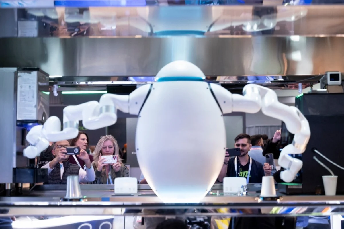 LAS VEGAS: An Adam robot from Richtech Robotics makes coffee at the Las Vegas Convention Center during the Consumer Electronics Show January 10, 2024, in Las Vegas, Nevada. -- AFP