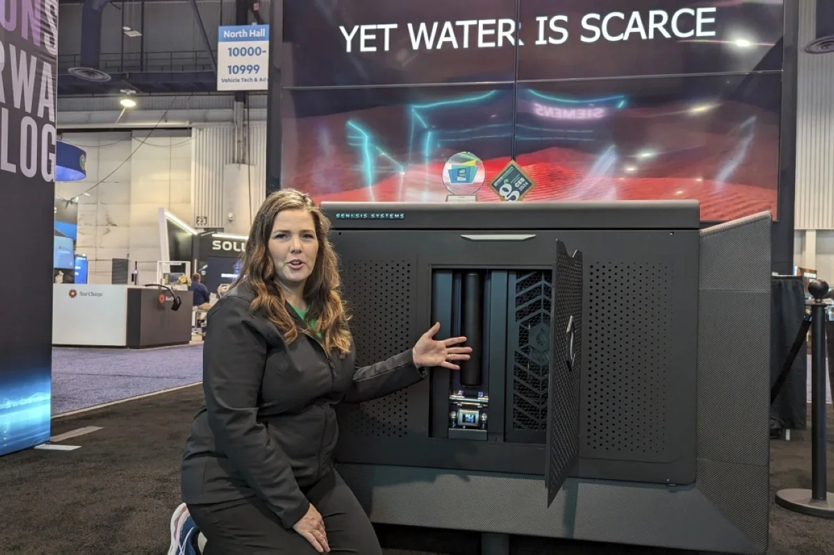 LAS VEGAS: Genesis Systems co-founder Shannon Stuckenberg discusses the inner workings of a WaterCube device that extracts water from the air during the Consumer Electronics Show (CES) in Las Vegas, Nevada, on January 12, 2024. -- AFP