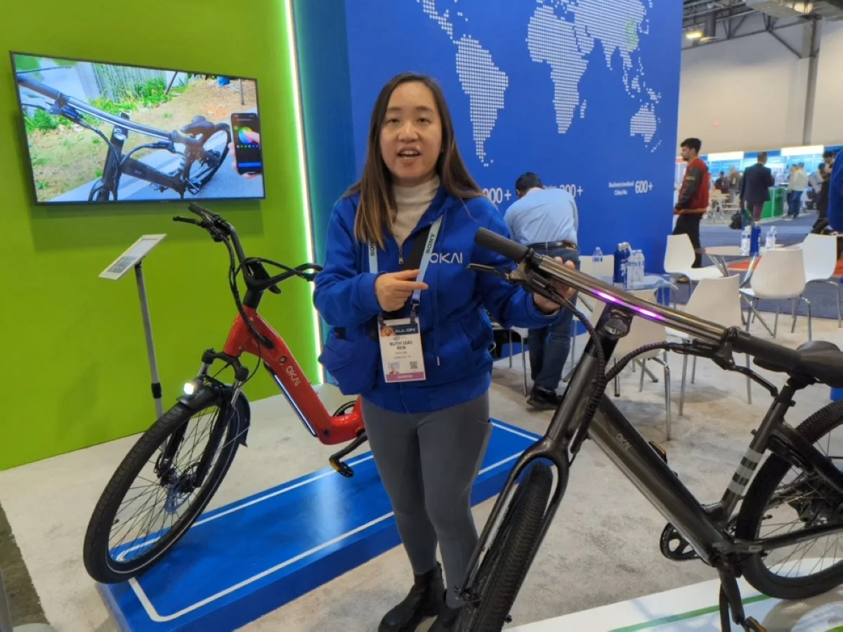 LAS VEGAS:Jia Ren shows off Okai's latest electric bicycle models at the Consumer Electronics Show (CES) in Las Vegas. – AFP