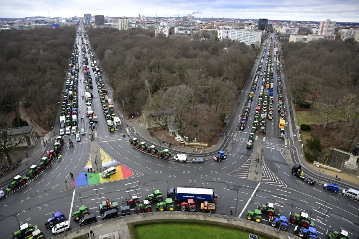 BERLIN: Tractors and trucks stand close to Berlin's landmark the Victory Column in the Tiergarten park during a protest of farmers and truck drivers, on January 15, 2024 in Berlin. -- AFP