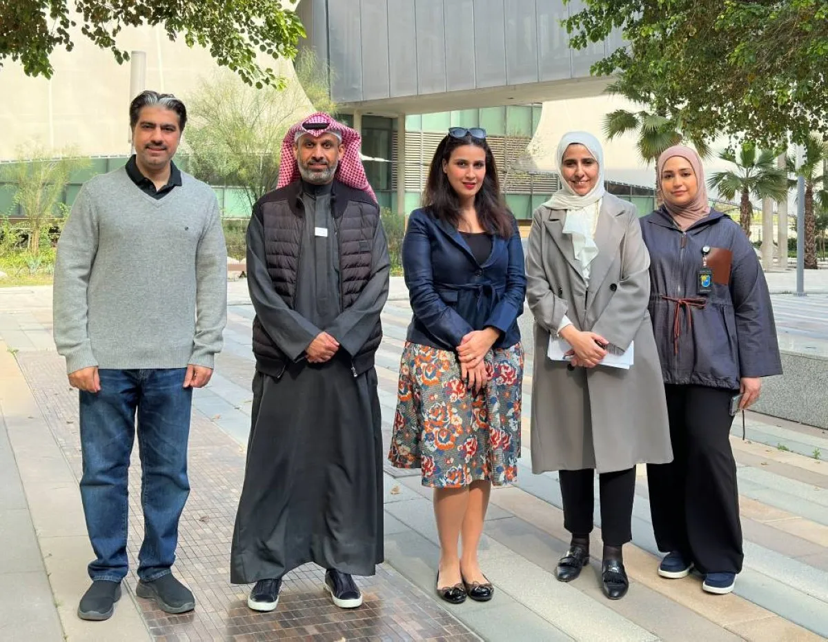 Officials from Zain, SACGC, and KU’s Computer Science Department.