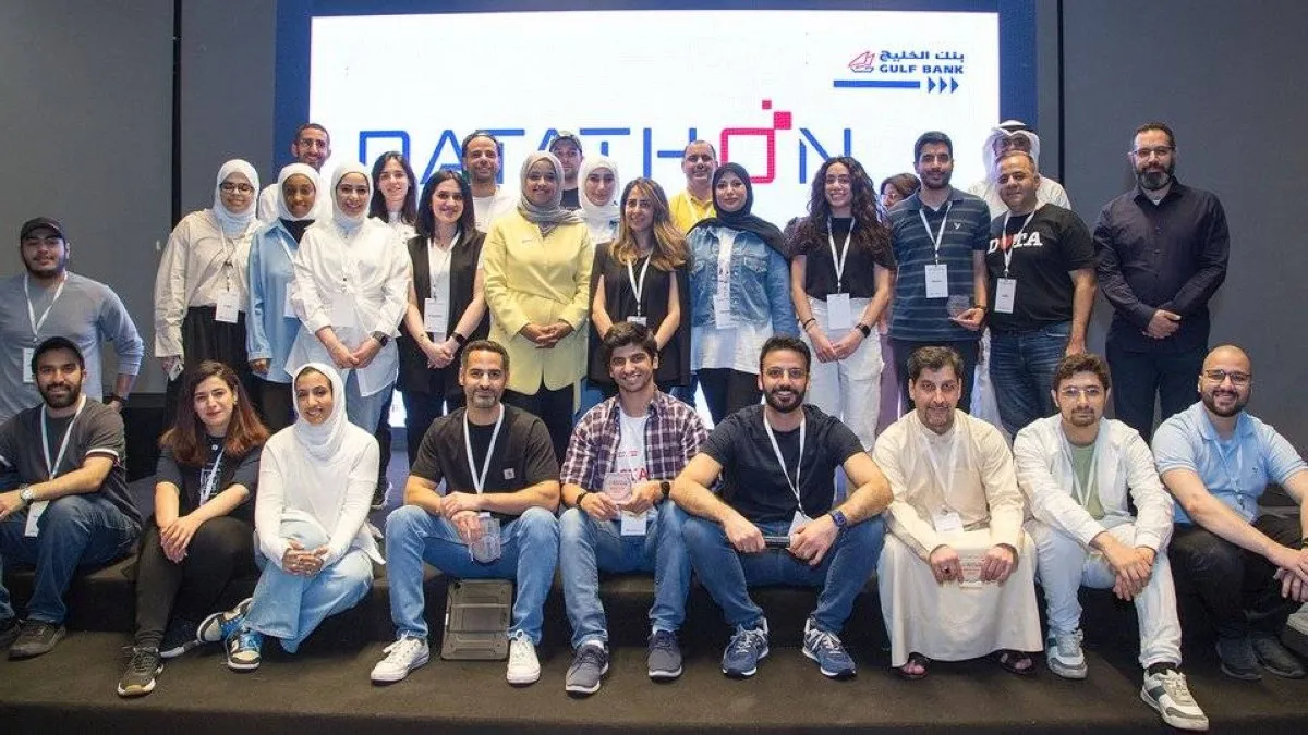 Mai Alowaish poses for a group photo with the winners of the second edition of the Datathon competition.