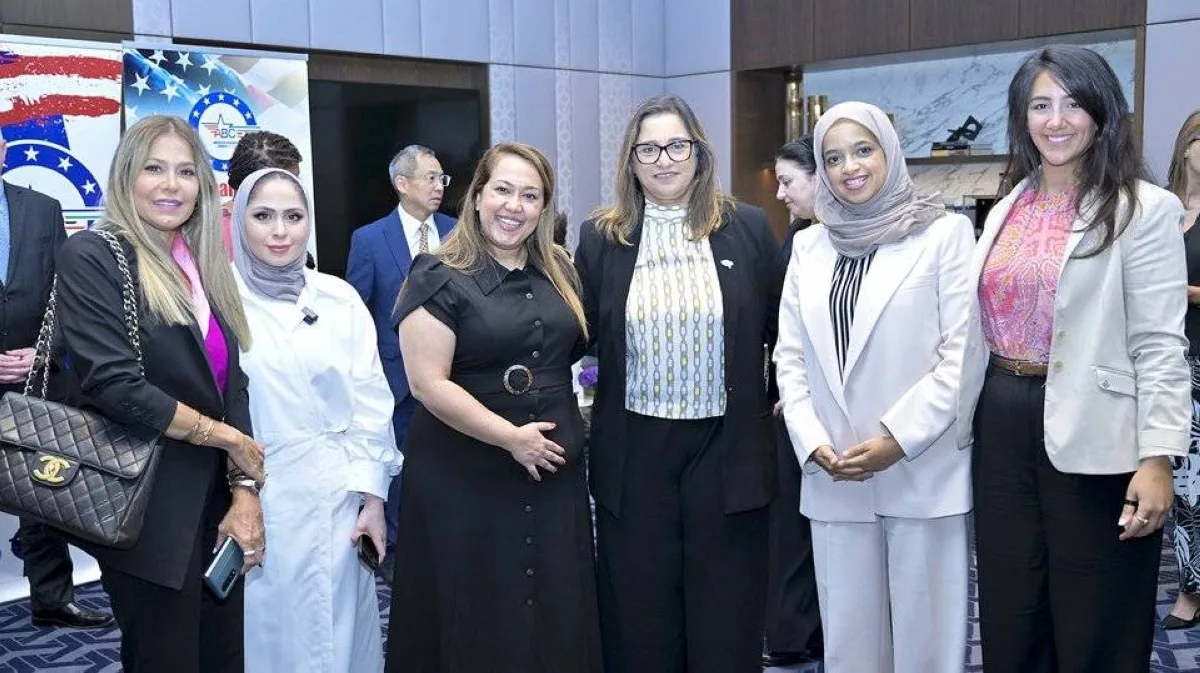 Salma Al-Hajjaj and representatives of the Gulf Bank during a symposium at the American Trade Advisory Center in Kuwait.