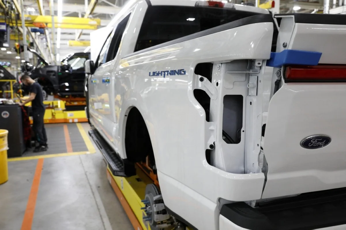 DEARBORN: Ford Motor Co battery powered F-150 Lightning trucks under production at their Rouge Electric Vehicle Center in Dearborn, Michigan on September 20, 2022. -- AFP