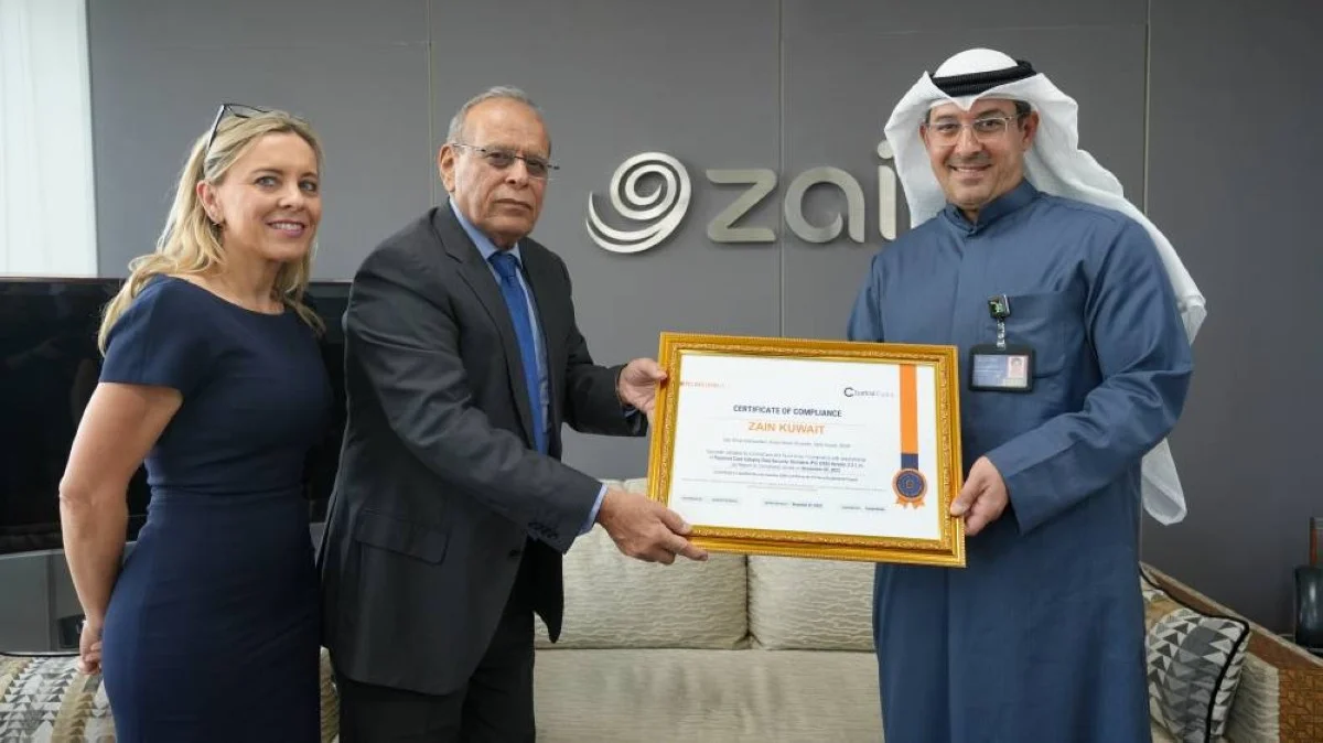 Nawaf Algharabally receives the certification.